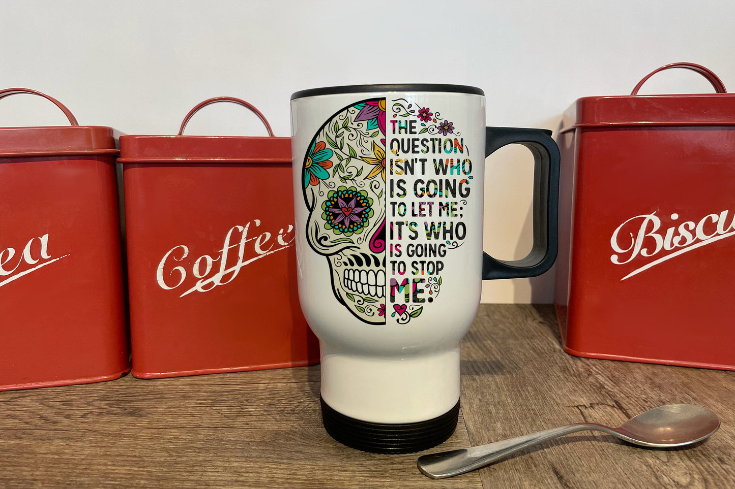 Sugar Skull Travel Mug with handle. A strong women looks danger in the eye and gives it a wink.