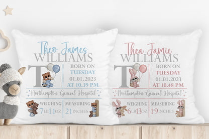 Two personalized baby birth announcement pillows with teddy bear graphics 