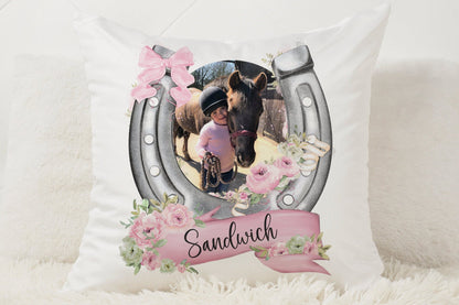 Decorative pillow with a horse and rider photo, pink flowers and a horseshoe